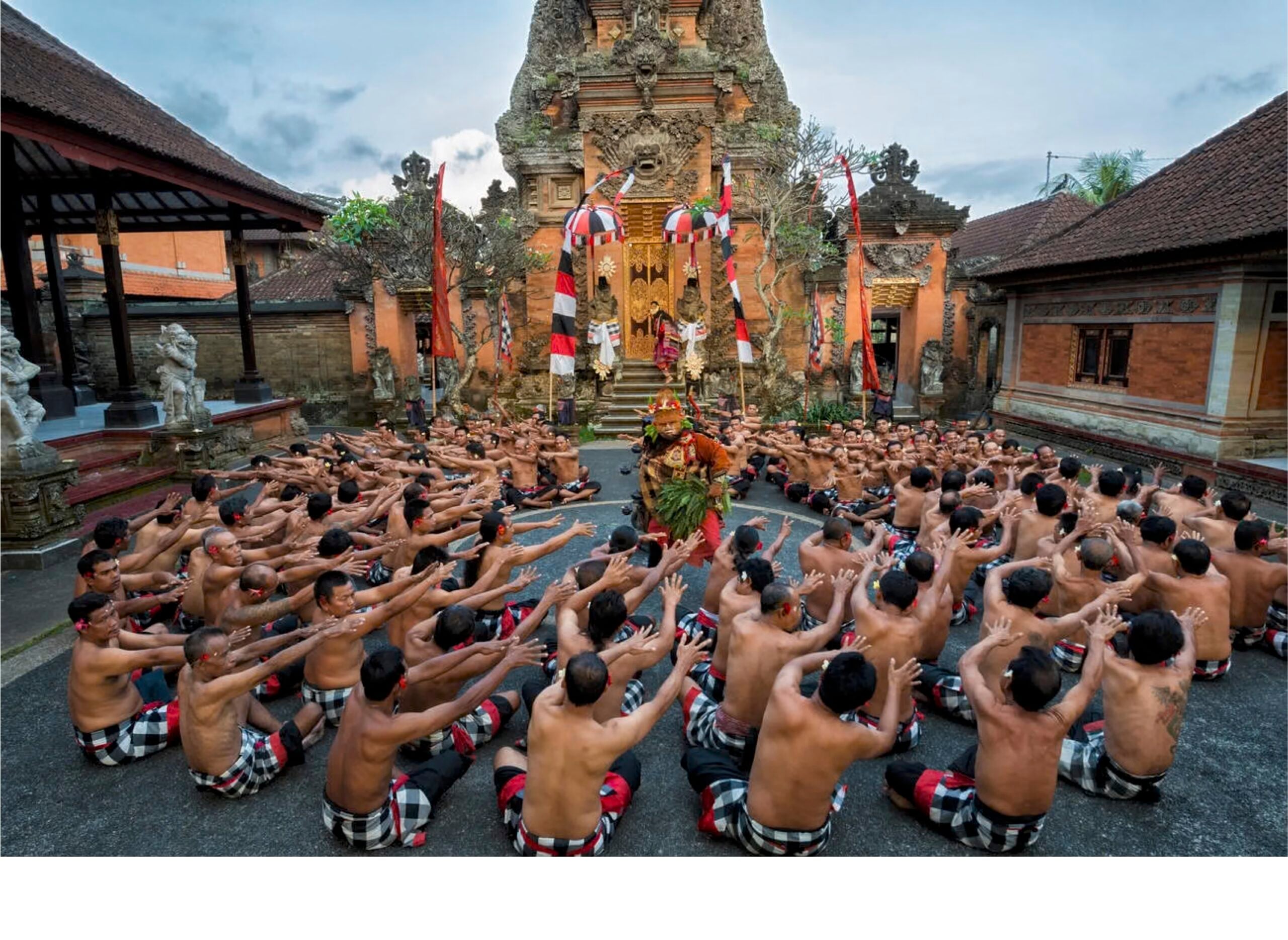 A circle of Balinese Kecak performers gathered in ceremony